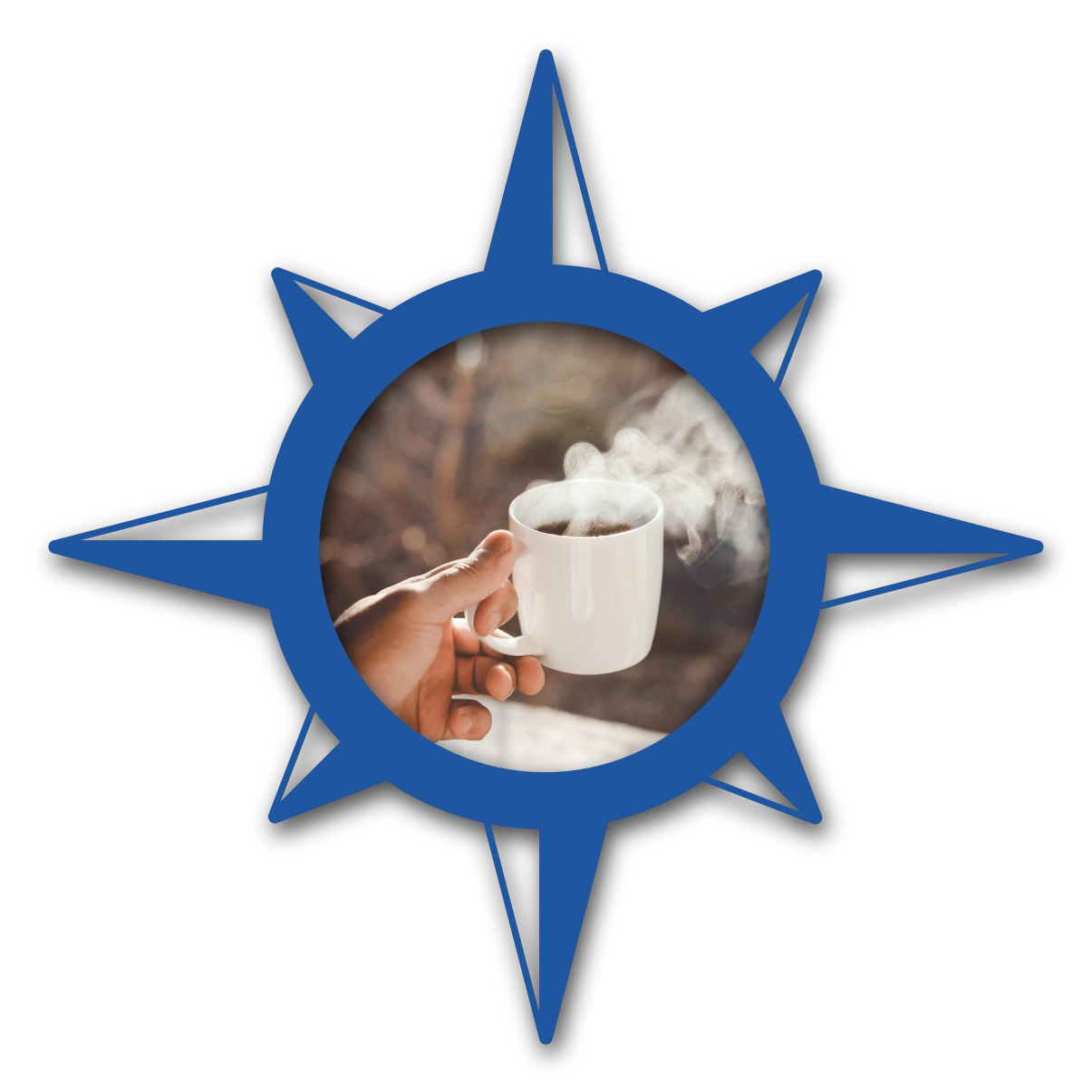 A hand holding a steaming mug of coffee